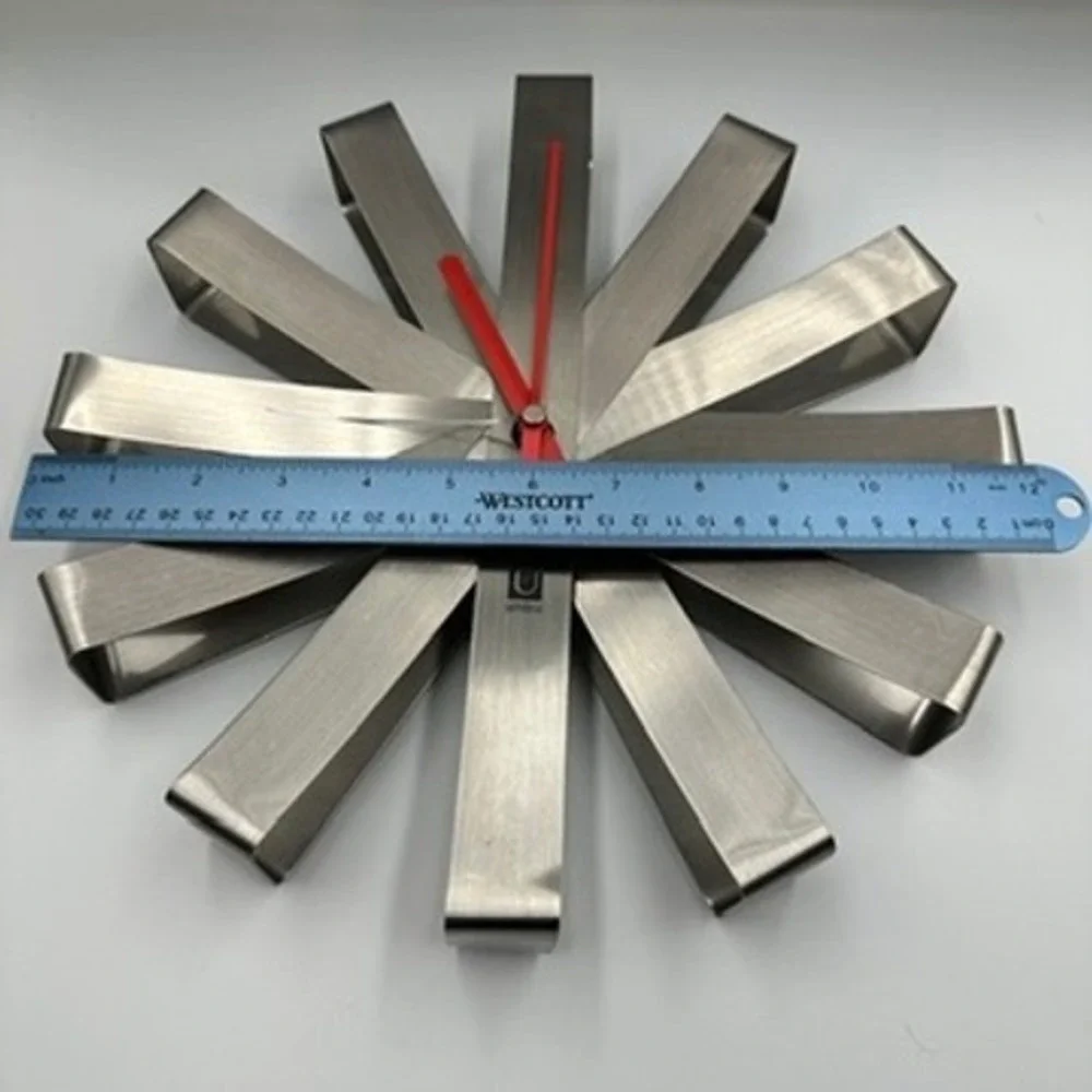 UMBRA wall clock by Michelle Ivankovic stainless steel ribbon sweep Seconds 12